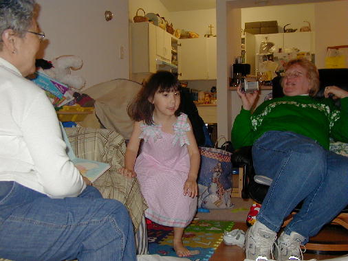 Halmeoni and Grammie admire the dress.