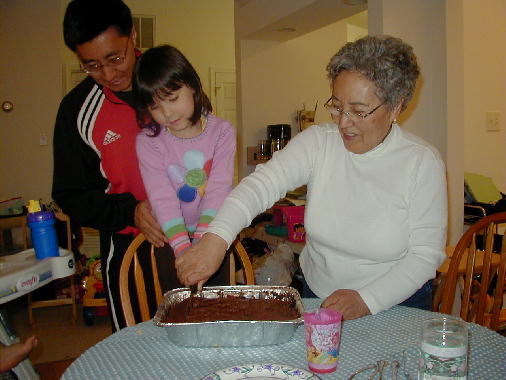 The cutting of the cake.